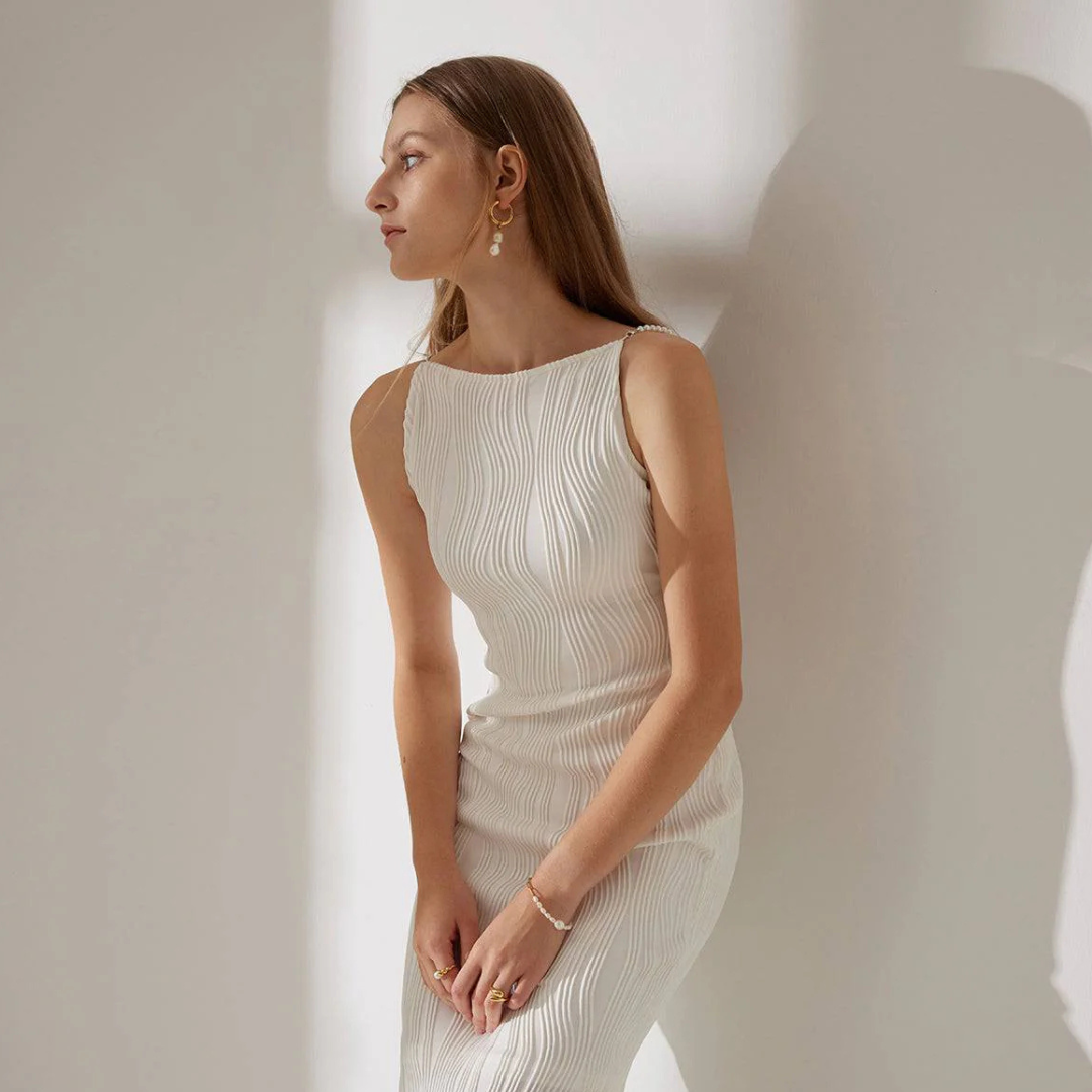 Elise-Ever Facebook ad: Some dresses you wear to an occasion. This one is the…