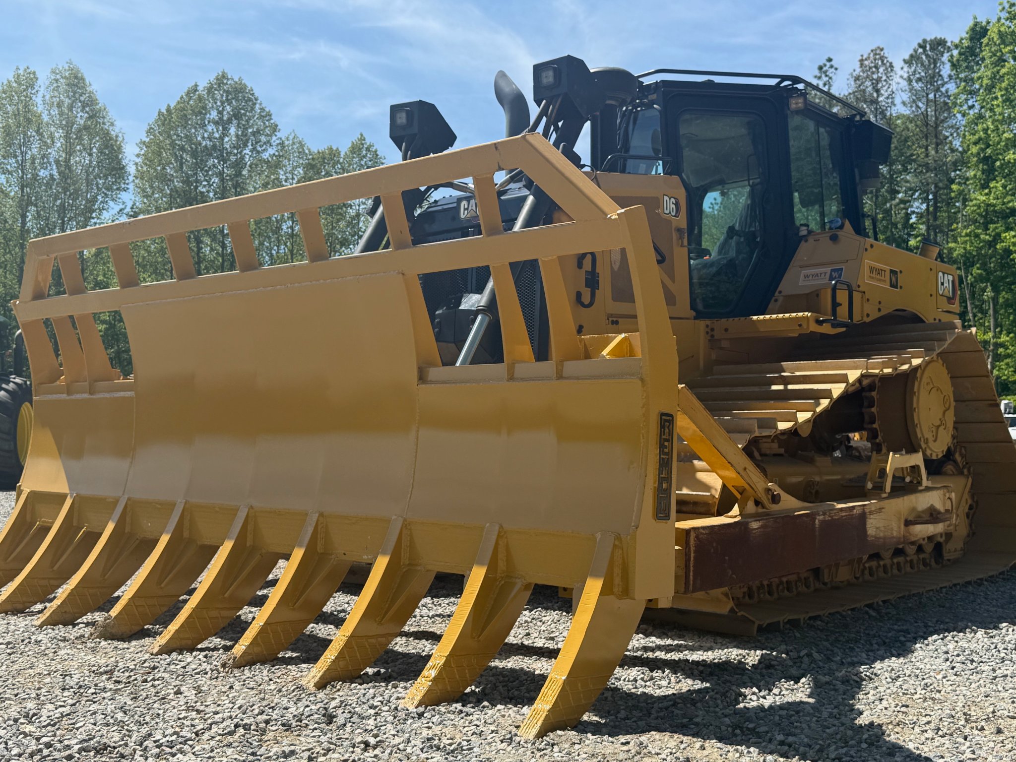 Wyatt Holzbach Facebook ad: 2022 Caterpillar D6 LGP Dozer w/ Custom Root Rake 500 Hours