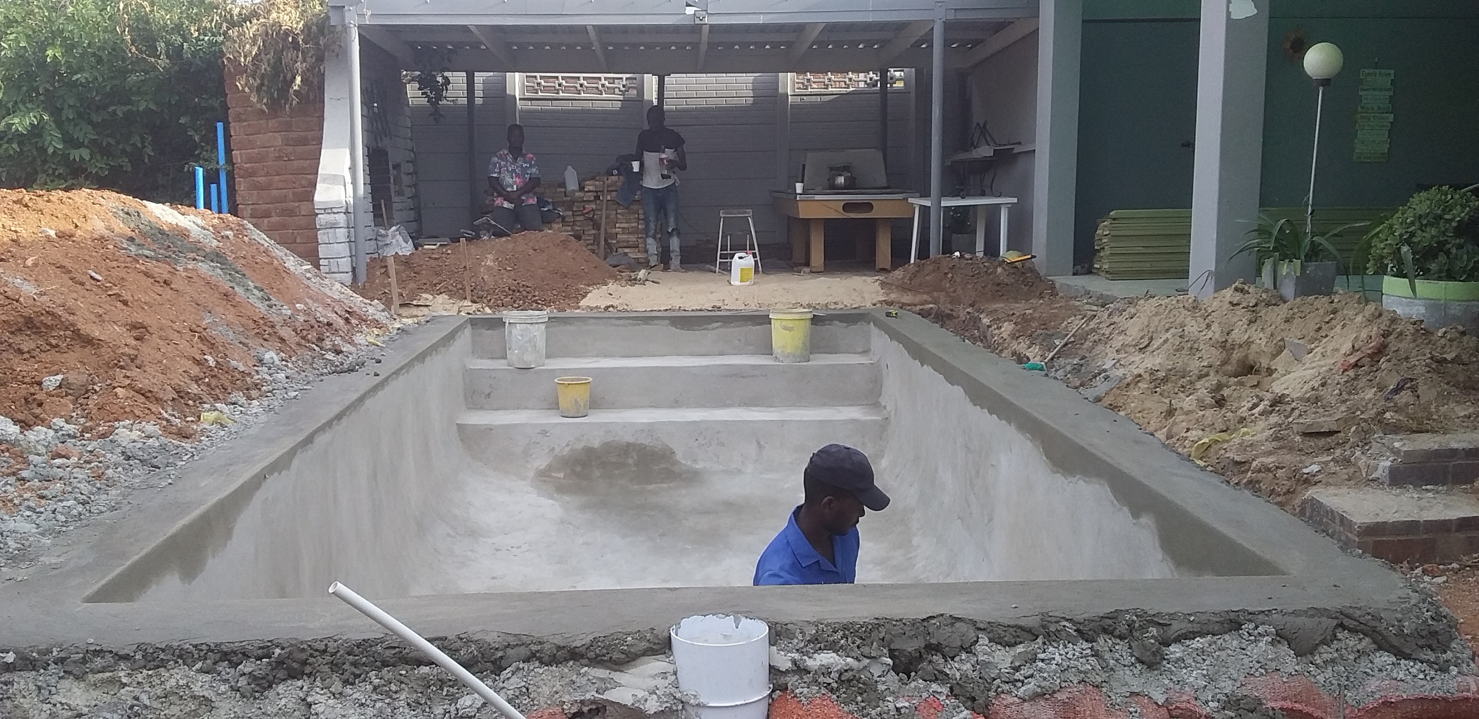 Global Construction Company Facebook ad: 8x4 Pool with deck around