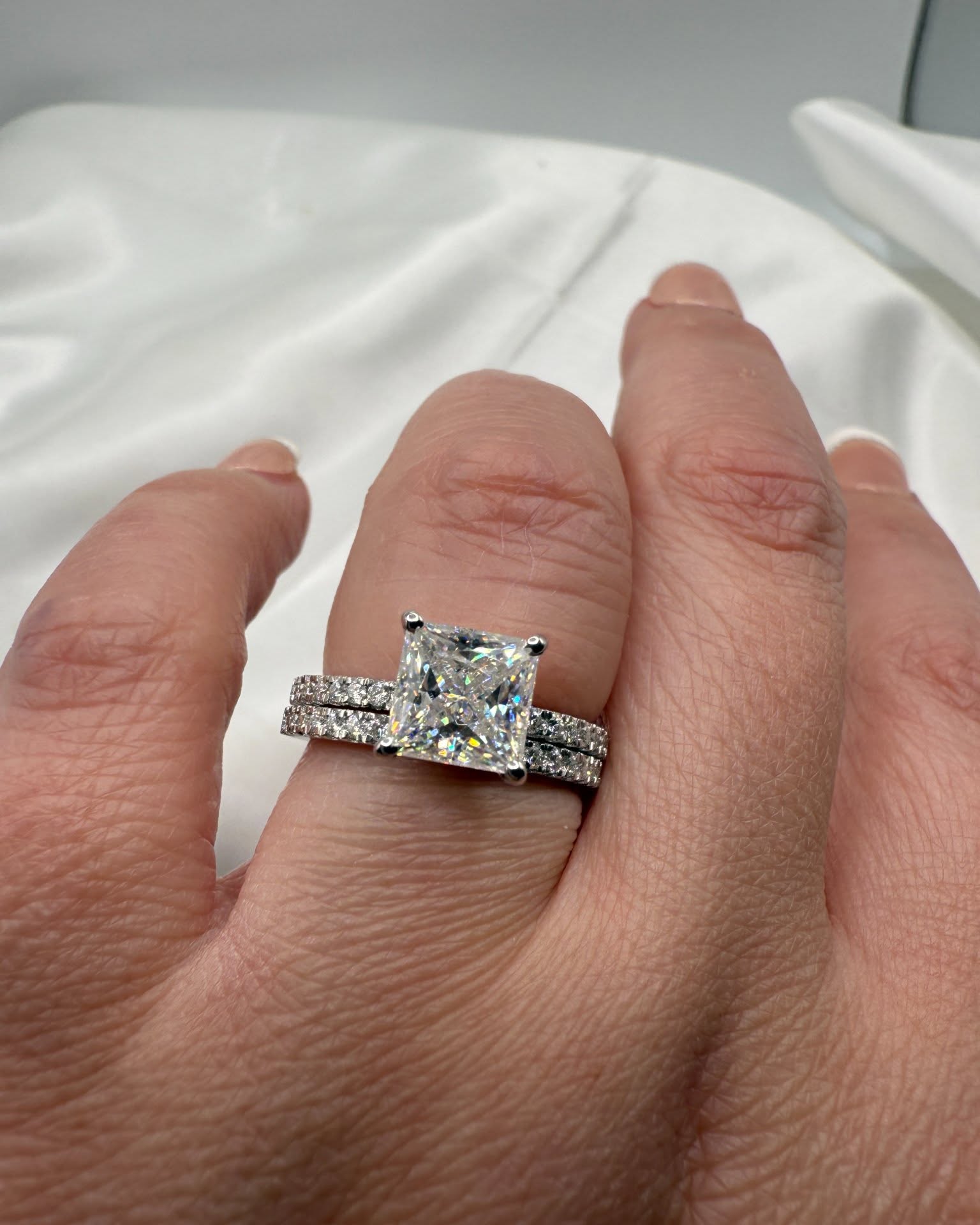 Nicole Solomon Facebook ad: 2 carat princess cut moissanite engagement ring and…