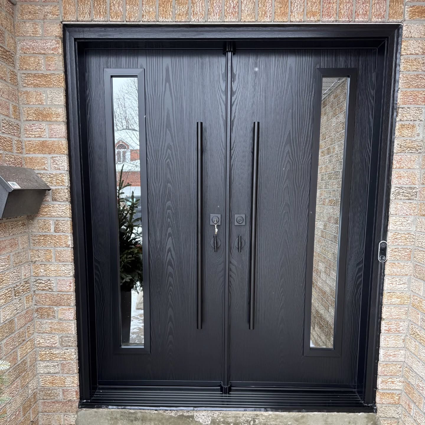 Ontario Windows & Doors Pro Inc. Facebook ad: Contemporary & Classic Front and Garage Doors