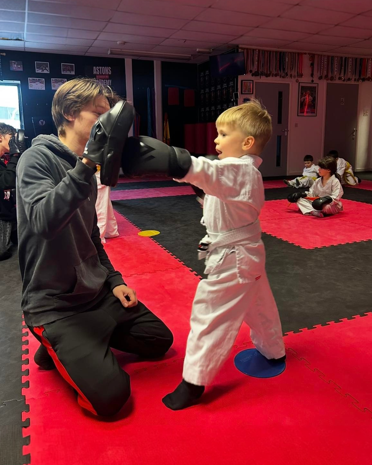 Astons Kickboxing Academy Facebook ad: We build confident kids!