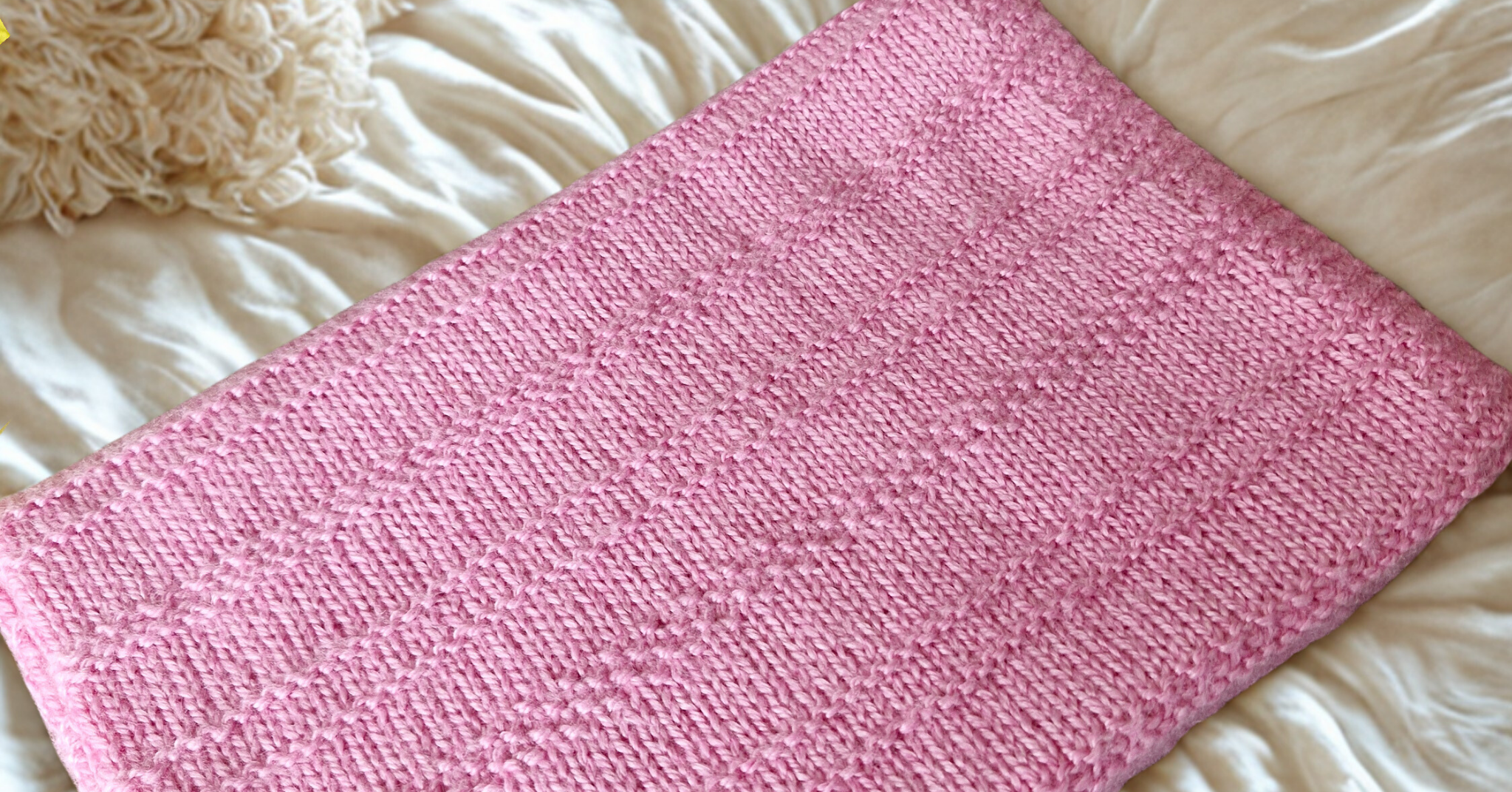 EasyKnits Facebook ad: Our Baby Blanket in a motif design.