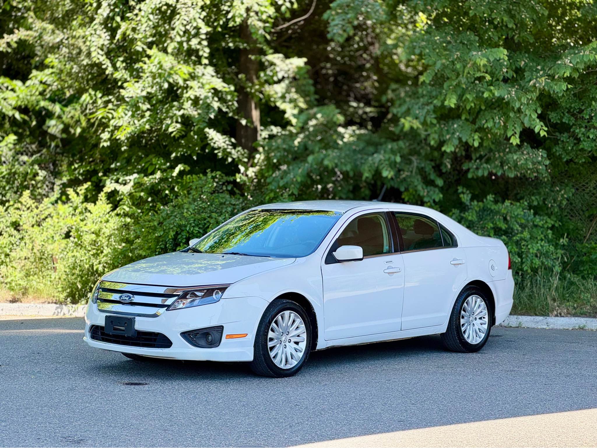 Humad B. Malik Facebook ad: 2012 Ford Fusion · Hybrid Sedan 4D