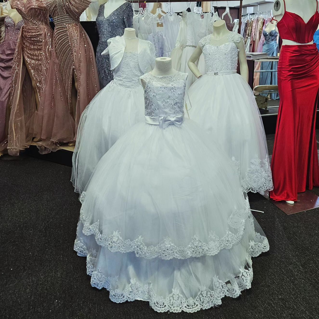 Gina's Fashion Boutique Facebook ad: Hermosos vestidos de comunion y bautizos de ginas…