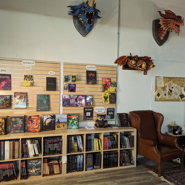 Prism Games Chicago Facebook ad: LGBTQ+ owned tabletop game store with community events.