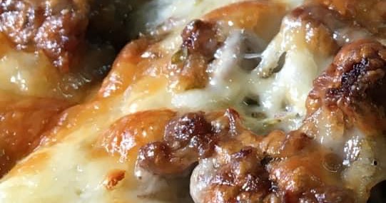 Spencer's Pizza Facebook ad: Ground Beef with Extra Cheese!