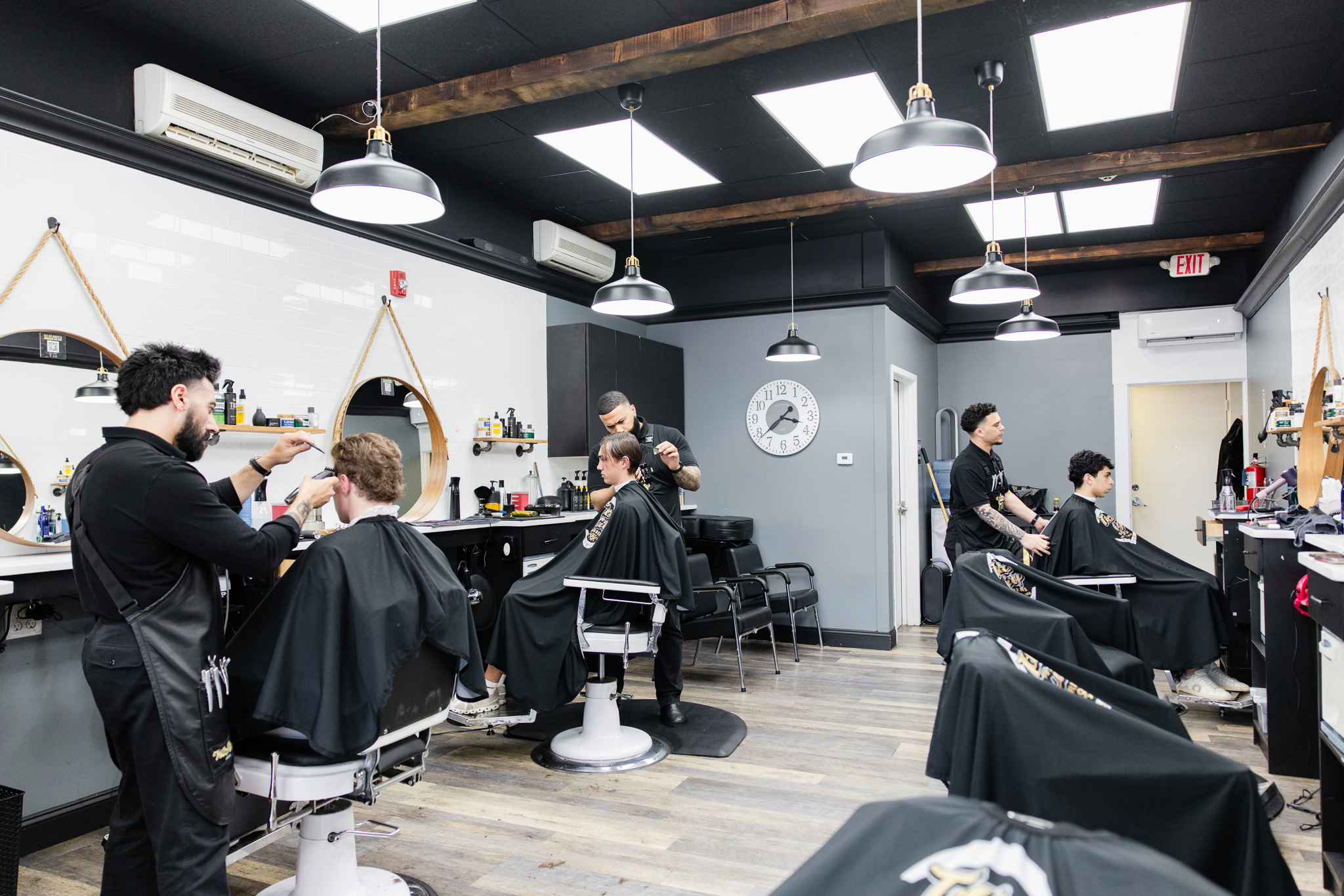 Title City Barbers Newton Facebook ad: Come and see why we’re the highest rated…