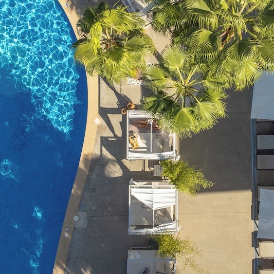 loveholidays Facebook ad: Swap the everyday for golden-hour cocktails and long…