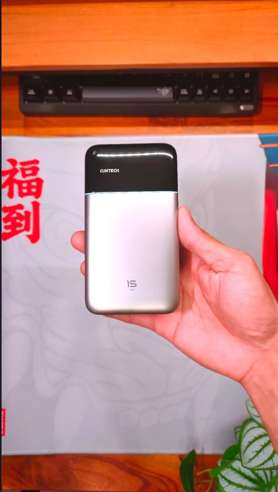 Medoky Setup Facebook ad: 15,000mAh, 65W, as slim as a book.
