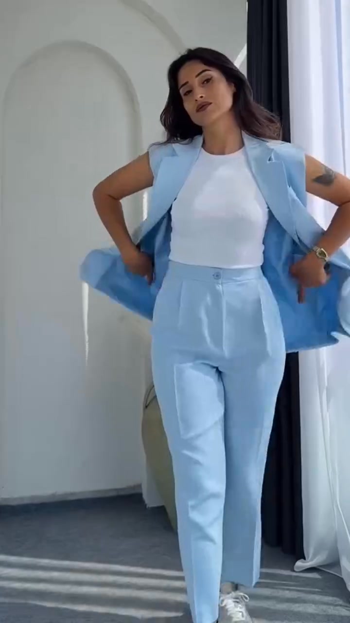 Rablaisie cool Facebook ad: This sleeveless blazer paired with high-waisted trousers is…