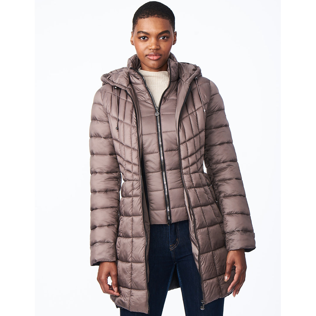 Bernardo Fashions Facebook ad: Discover timeless outerwear designed for the modern woman.