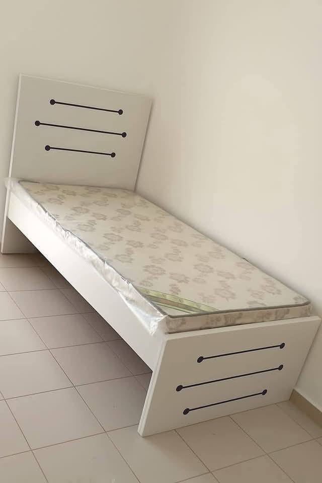 Century mattress store Facebook ad: Furniture New Year OFFER Delivery FREE