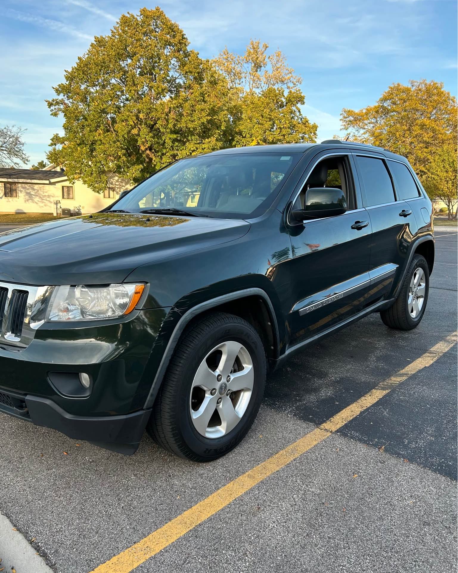 Sue Kreuter-Gleason Facebook ad: 2011 Jeep Grand Cherokee · Laredo Sport Utility 4D