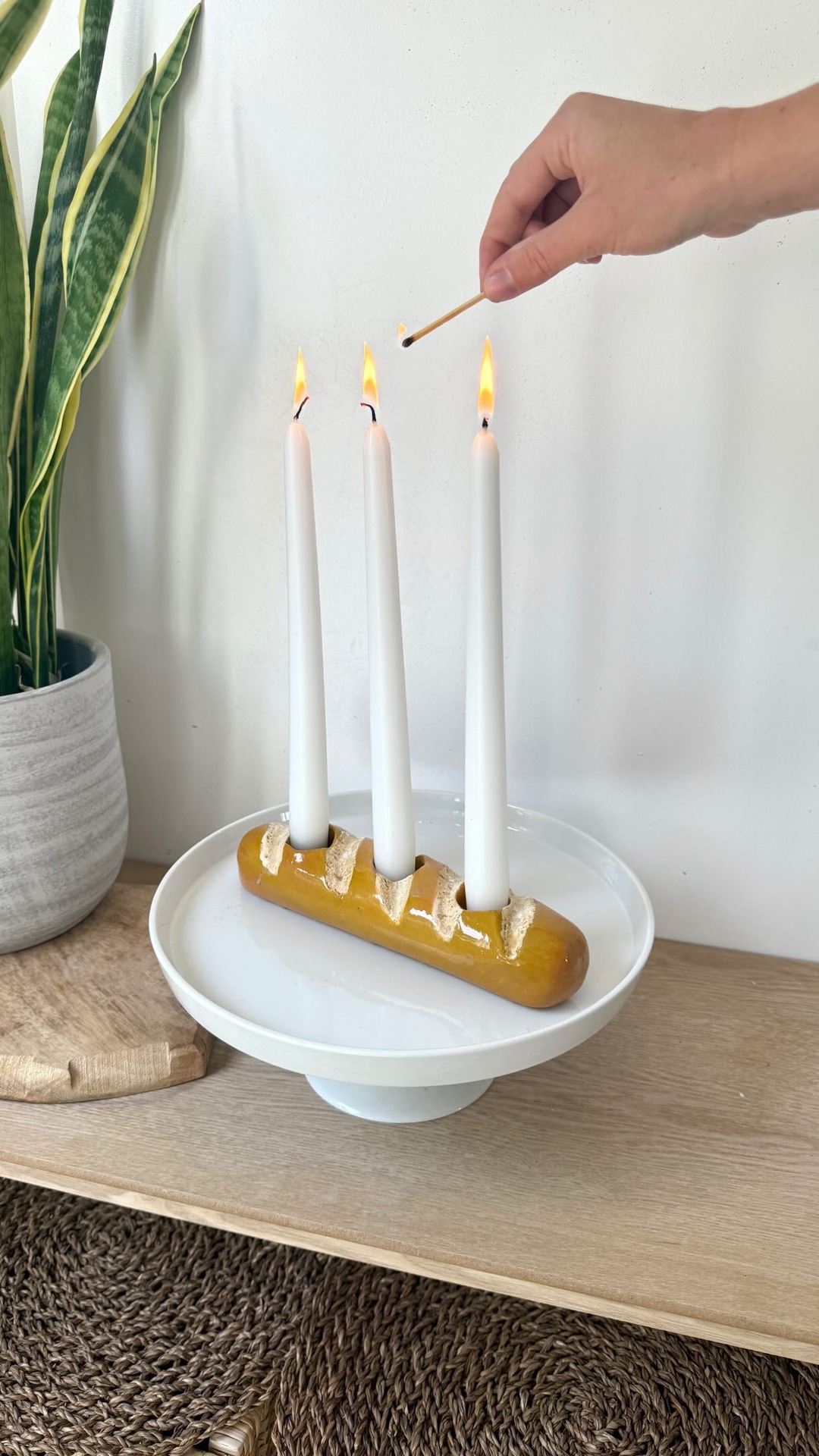 Sculpd Facebook ad: is that…a baguette candle holder?!