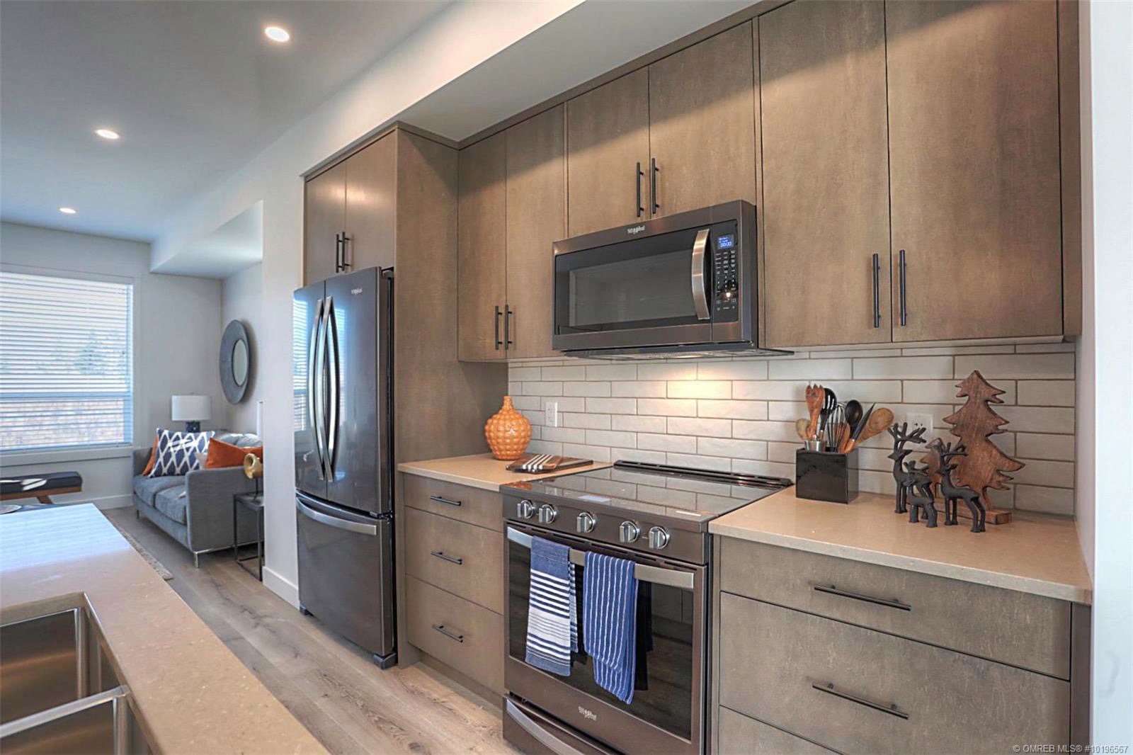 Academy Ridge Facebook ad: 3 bed+ townhomes near UBCO featuring unique lock-off…