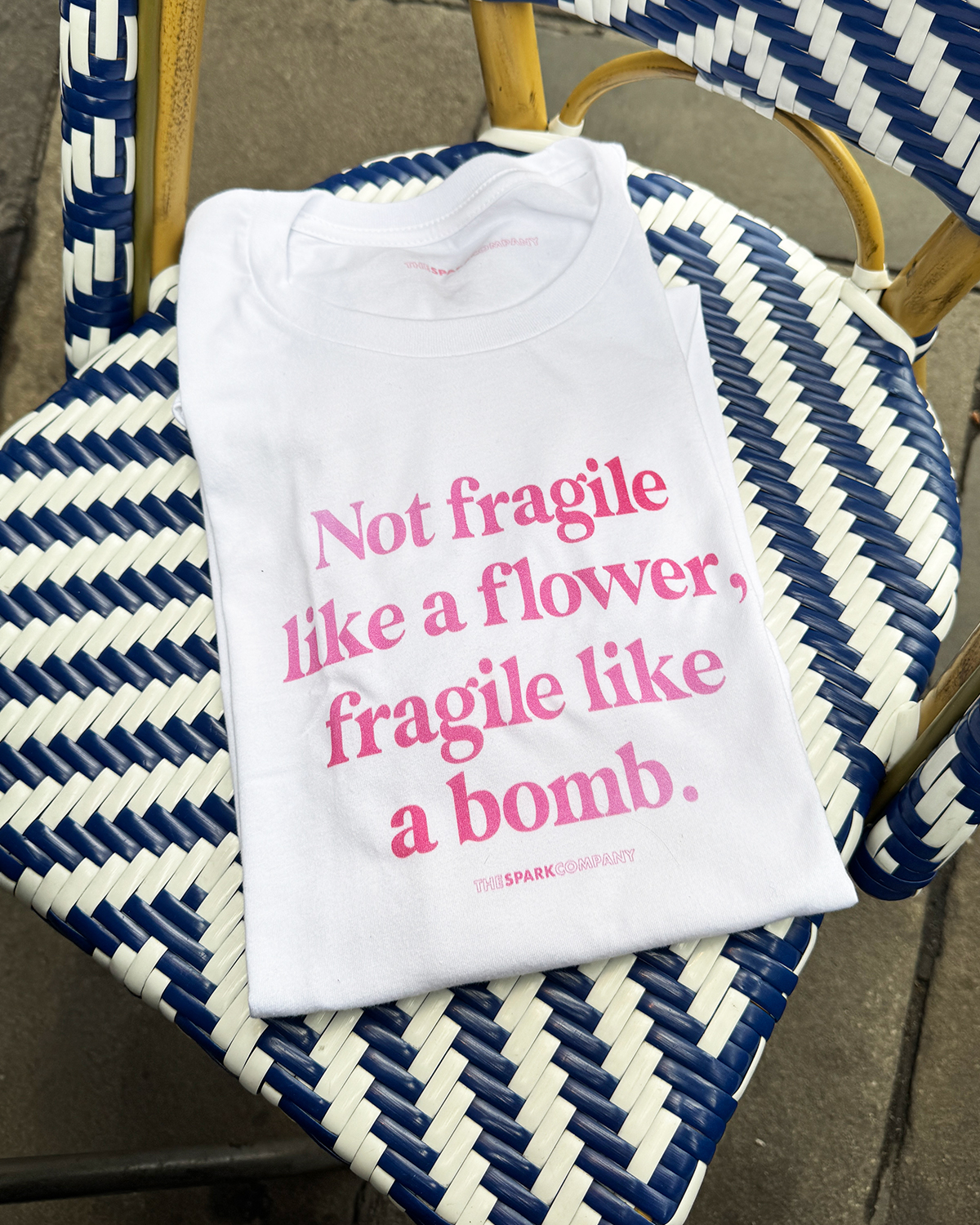 The Spark Company Facebook ad: Every Purchase Helps A Woman In Need
