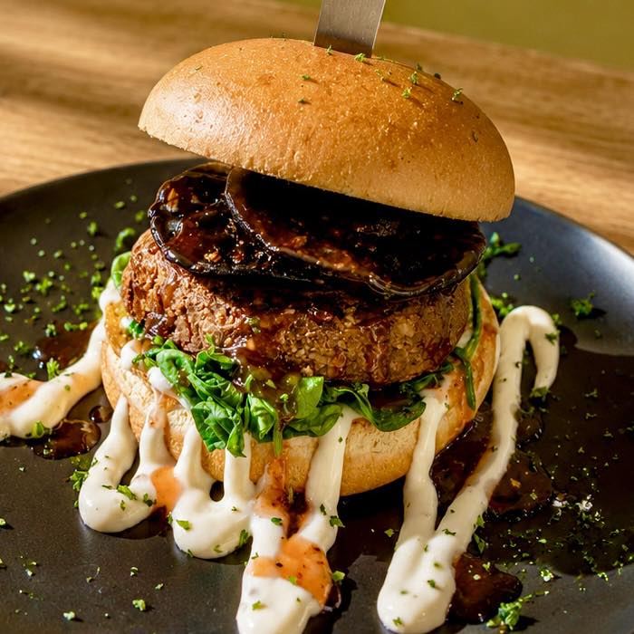 Artisan Cafe Facebook ad: PLANT-BASED, GLUTEN-FREE & DELICIOUS, EVERYONE IS WELCOME!