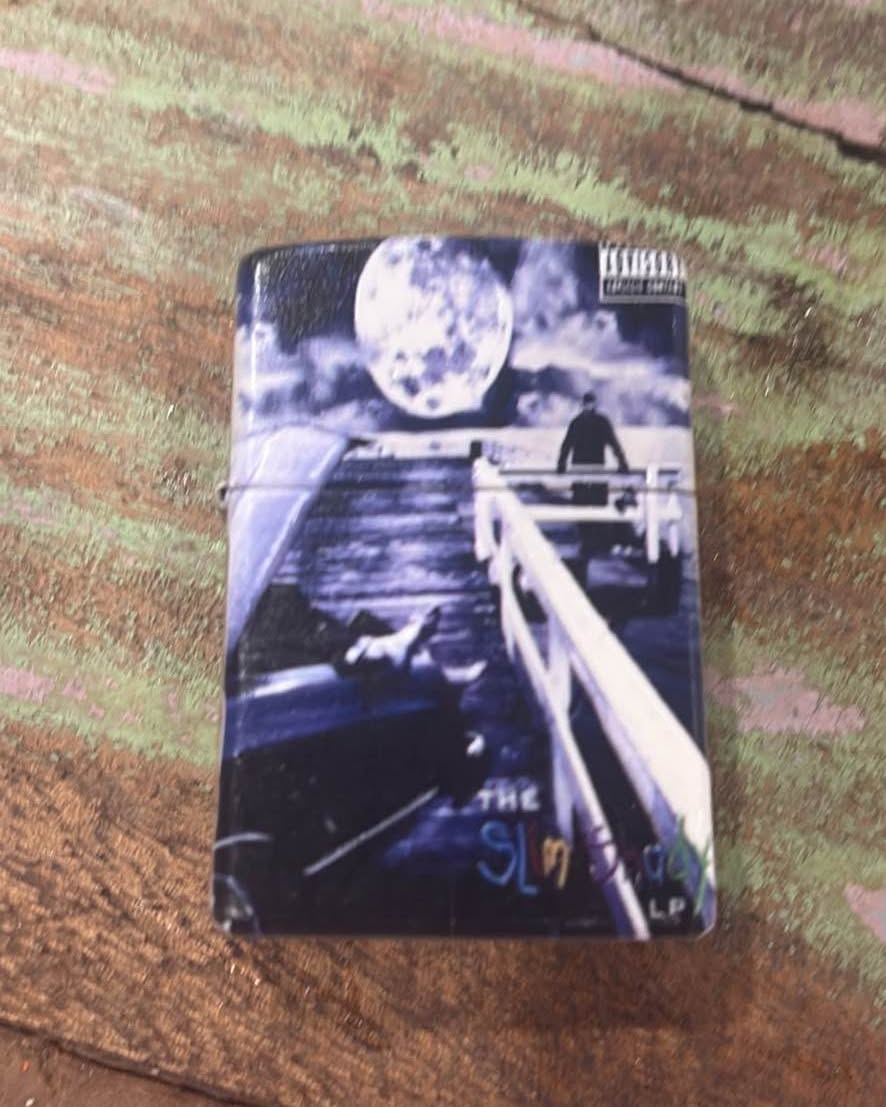 Steve Coussens Facebook ad: Eminem Slim Shady LP zippo