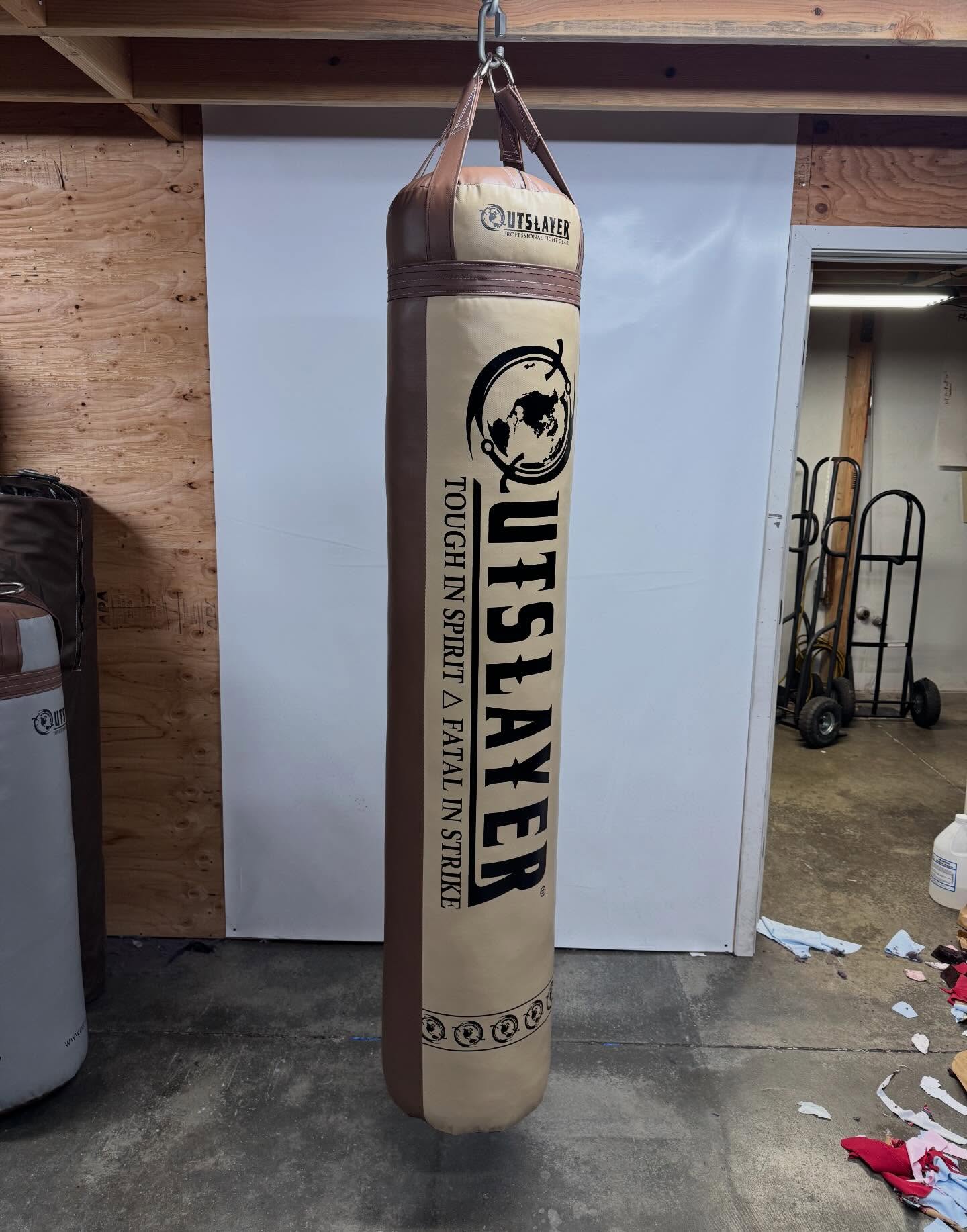 Outslayer Fight Gear Facebook ad: Outslayer Custom Punching Bags & Gloves
