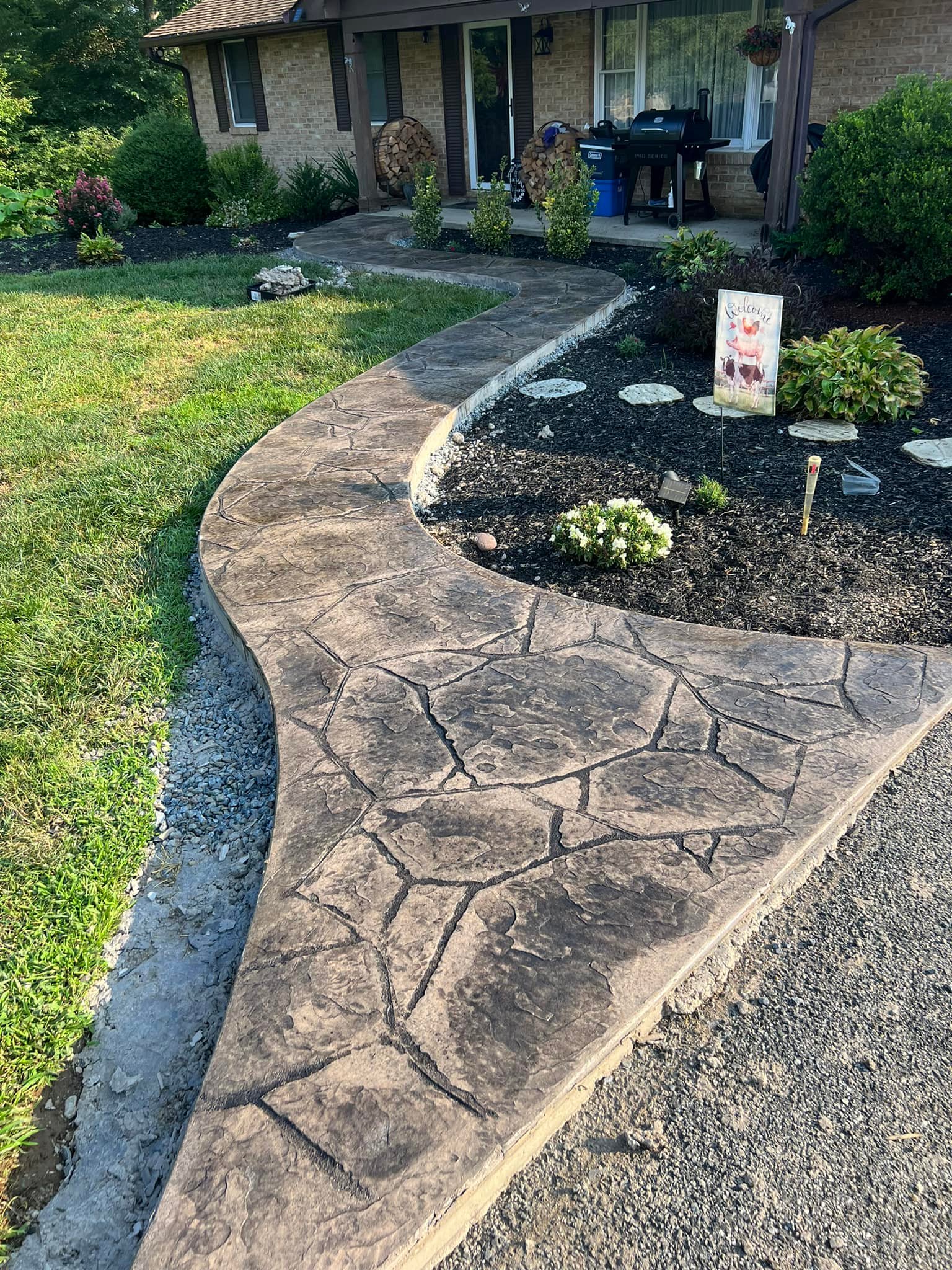 Lynch&Son Concrete Facebook ad: Looking to upgrade your old concrete or create…