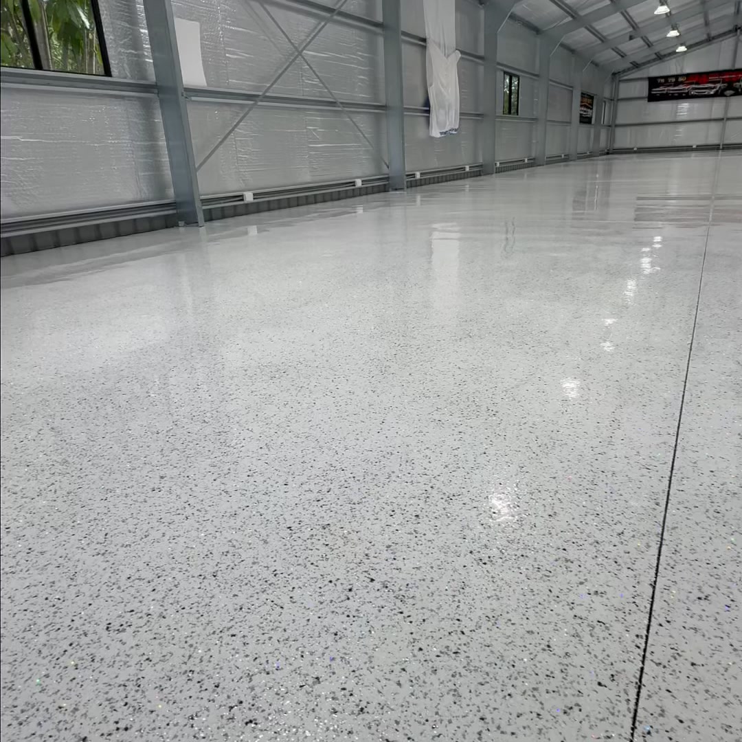 Queensland Flooring Systems Facebook ad from May 27, 2026