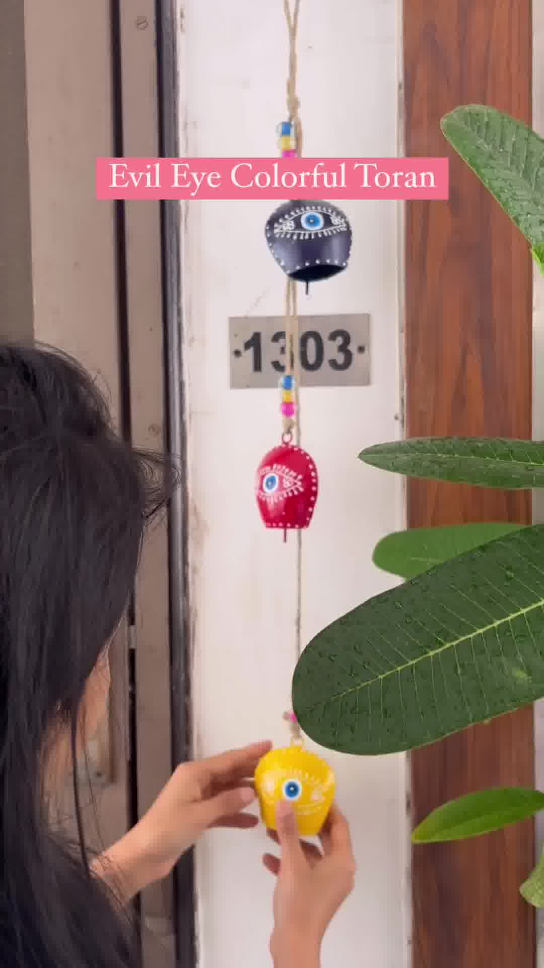 Jasmey HOMES Facebook ad: Ward Off Negativity with Our Stunning Evil Eye Bell!