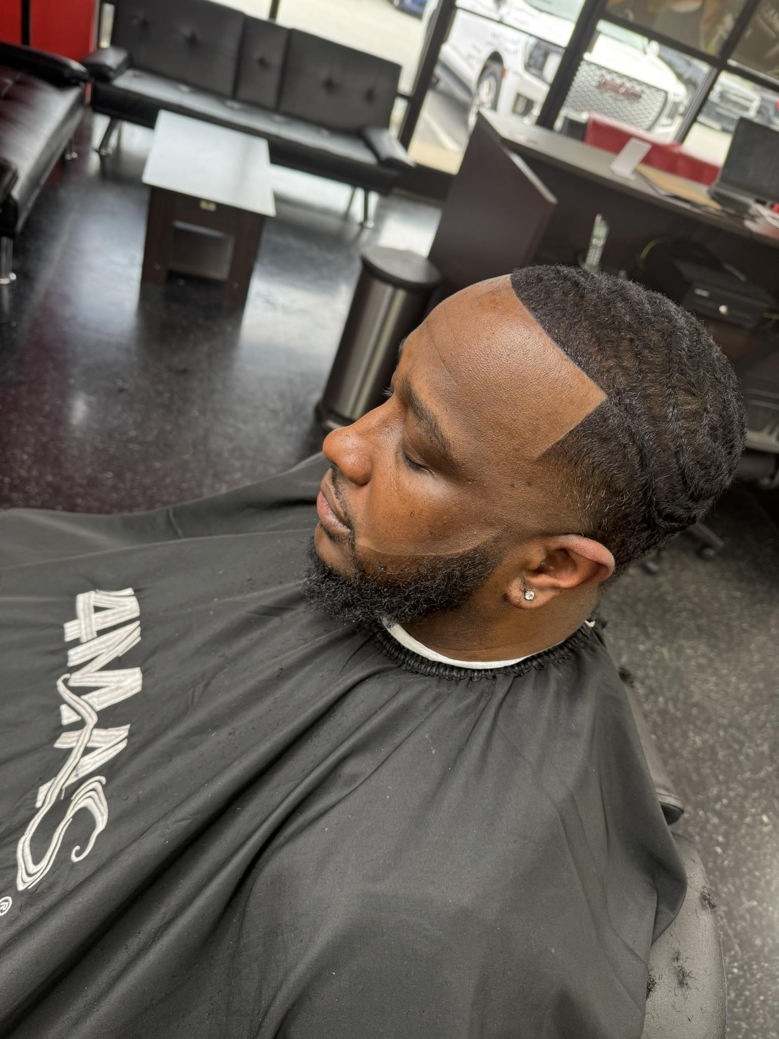 Cut N' Shears Barber Shop Facebook ad: Book Now - Cut N