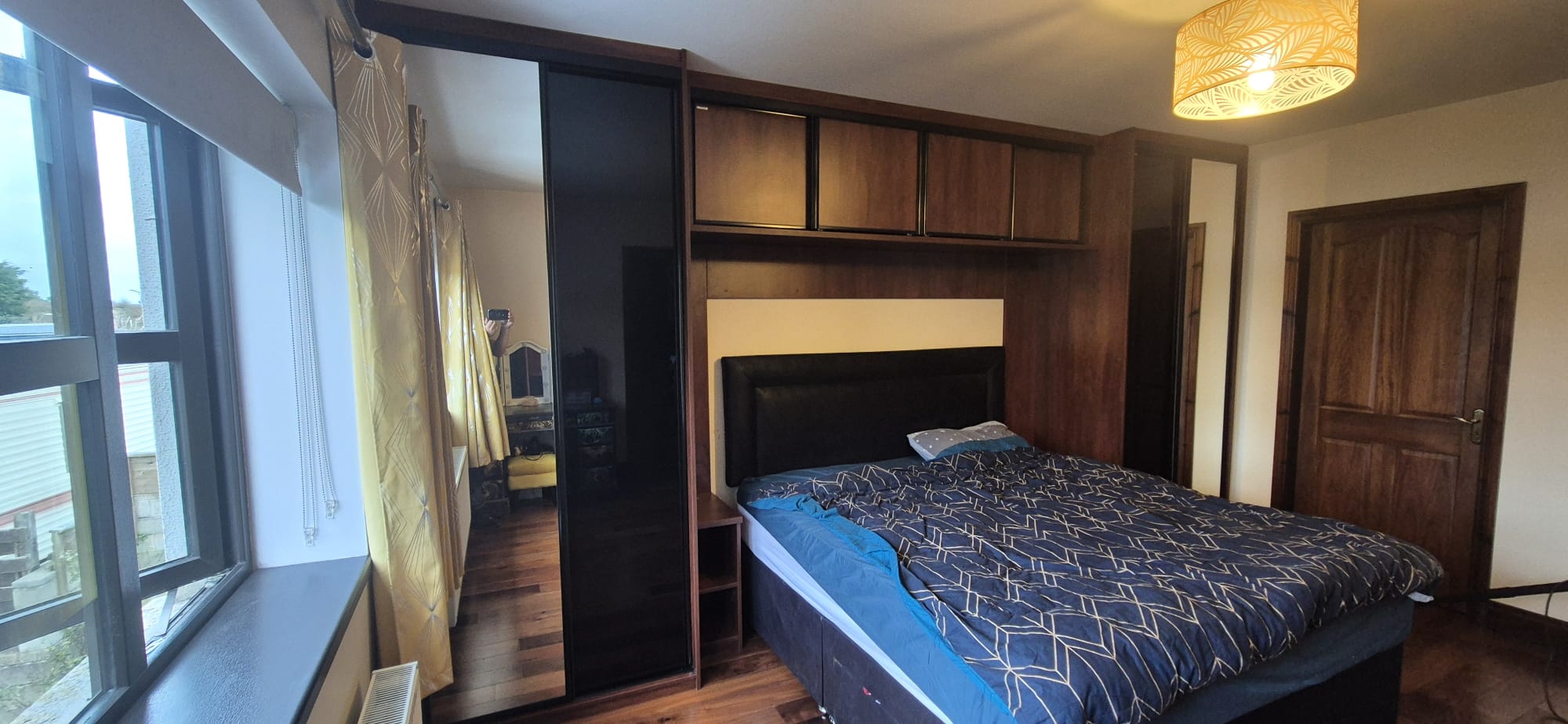Komandor Storage Solutions Facebook ad: SLIDING WARDROBE WITH OVERBED STORAGE