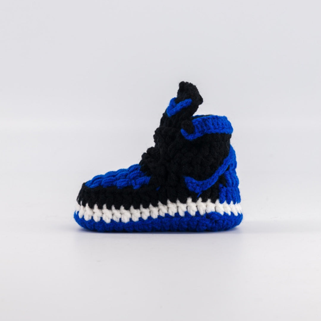 Baby Sneakers Shop Facebook ad: You are one click away to offer baby…