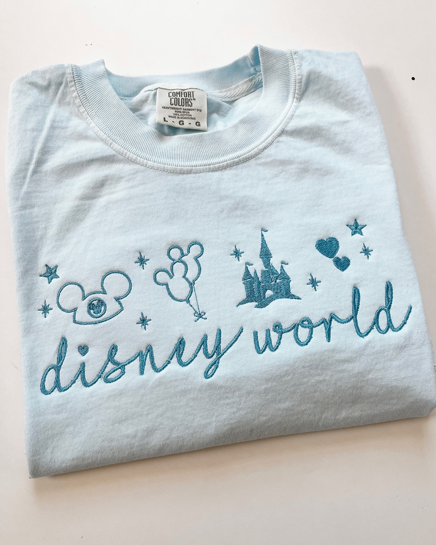 Jolly Holiday Embroidery Facebook ad: Disney world version