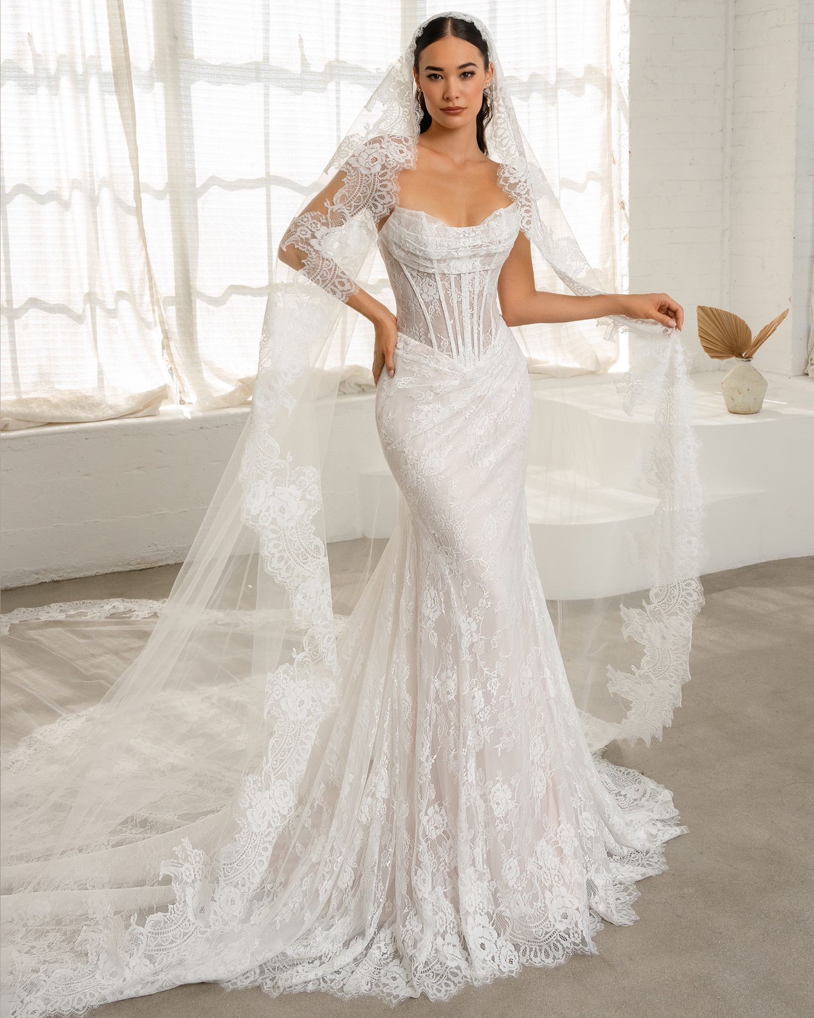 Kitty Chen Couture Facebook ad: Where sexy meets elegant.