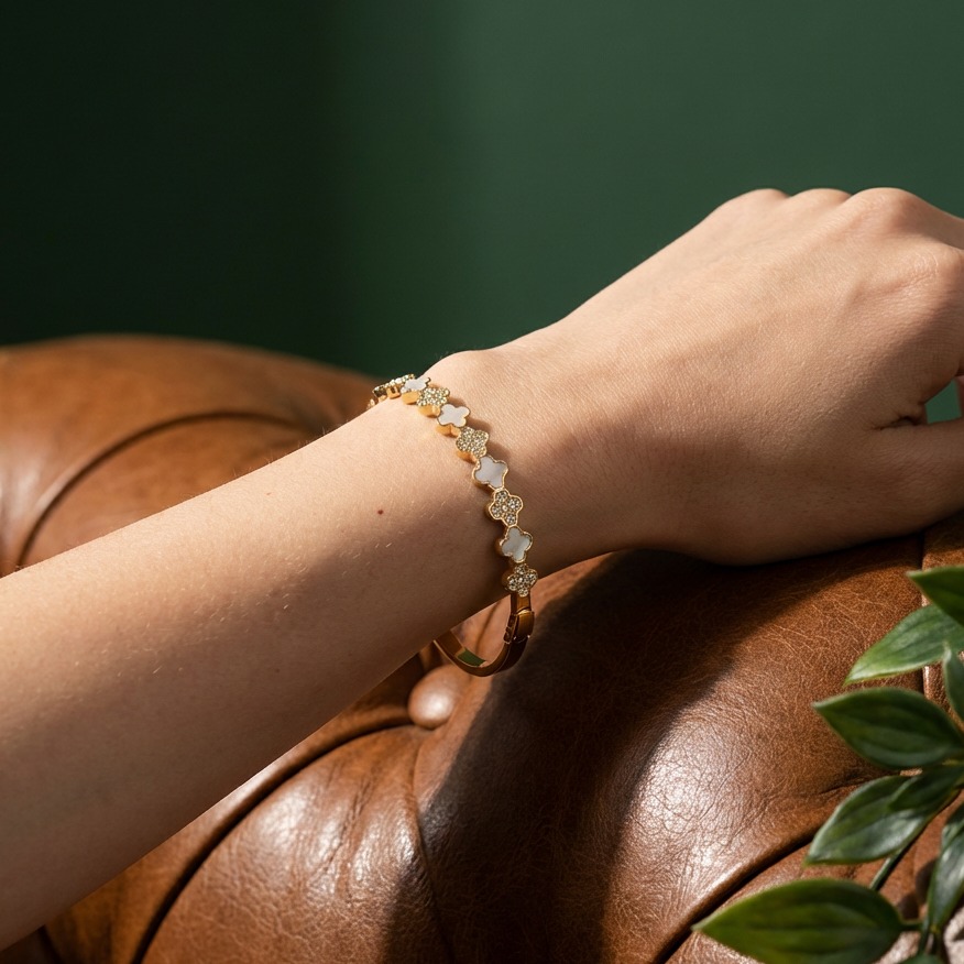 Vendome Jewelry Facebook ad: Alternating between the soft, iridescent glow of white…