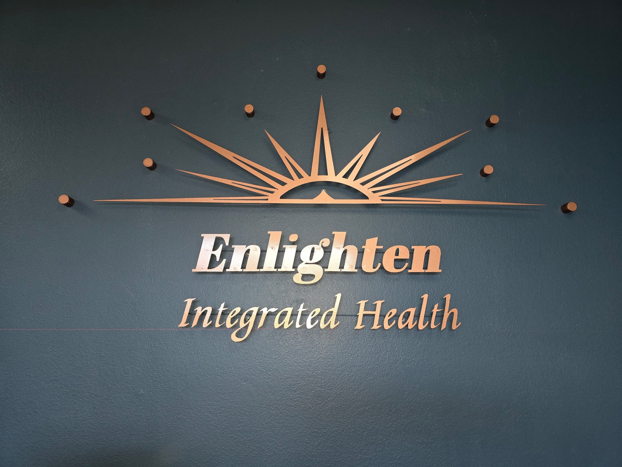 Lucas Chiropractic & Enlighten Integrated Health Facebook ad: Care That Connects