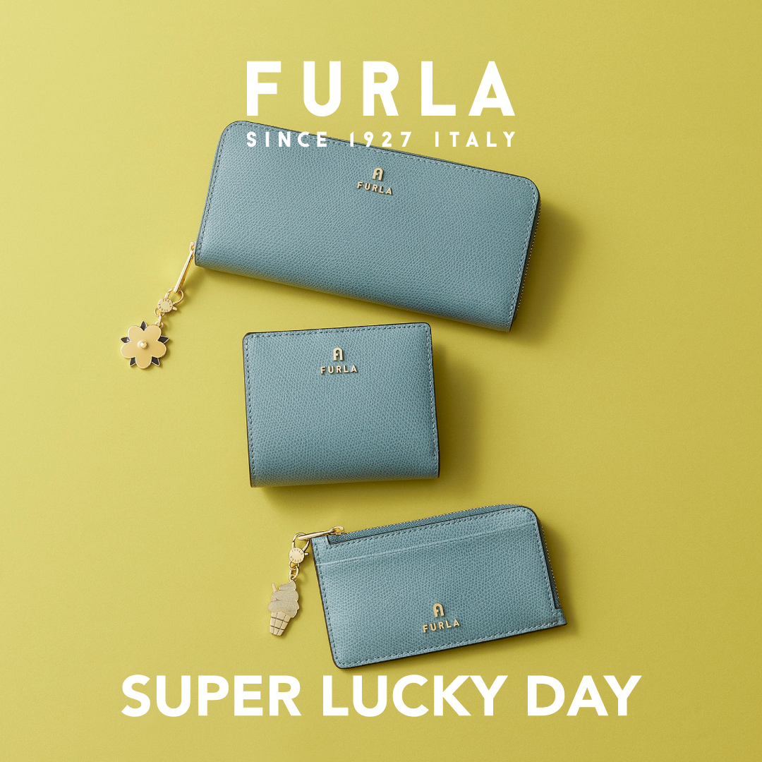 Furla Facebook ad: 最強開運日に向けて、フルラのレザーグッズとチャームで運気も気分もアップ。上質な素材と色とりどりのカラーバリエーションか…