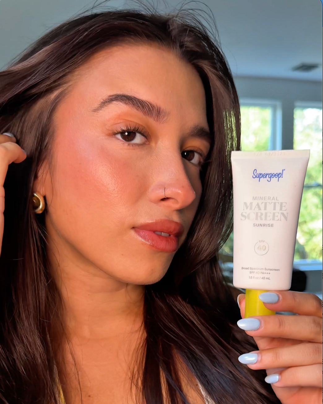 Supergoop Facebook ad: Mattifies and blurs skin with 12-hour shine control…