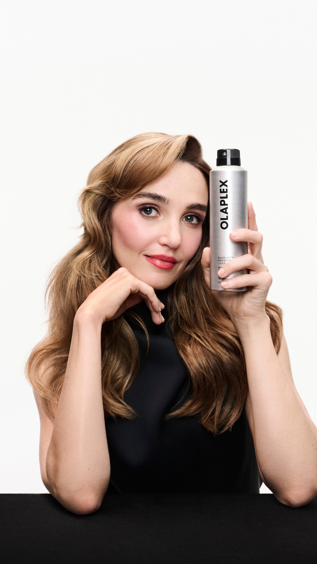 Olaplex Facebook ad: Reshape the rules with Shape Set Hairspray.