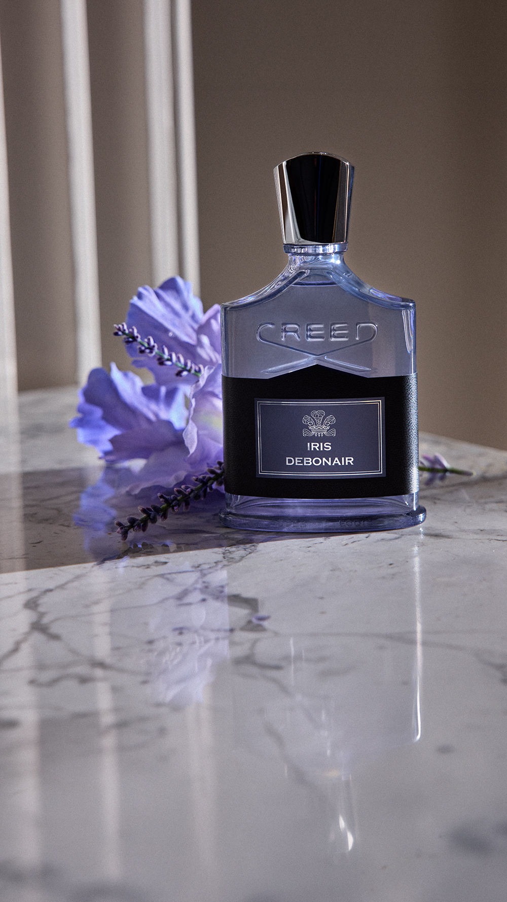 Creed Fragrance Facebook ad: Unlock Iris Debonair
