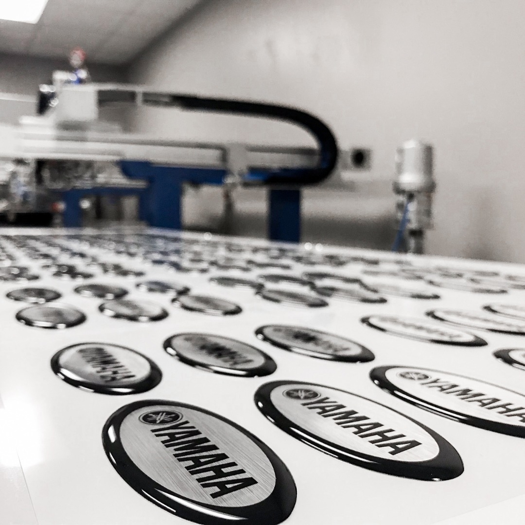 IMPACT LABEL CORPORATION Facebook ad: Printing and Design