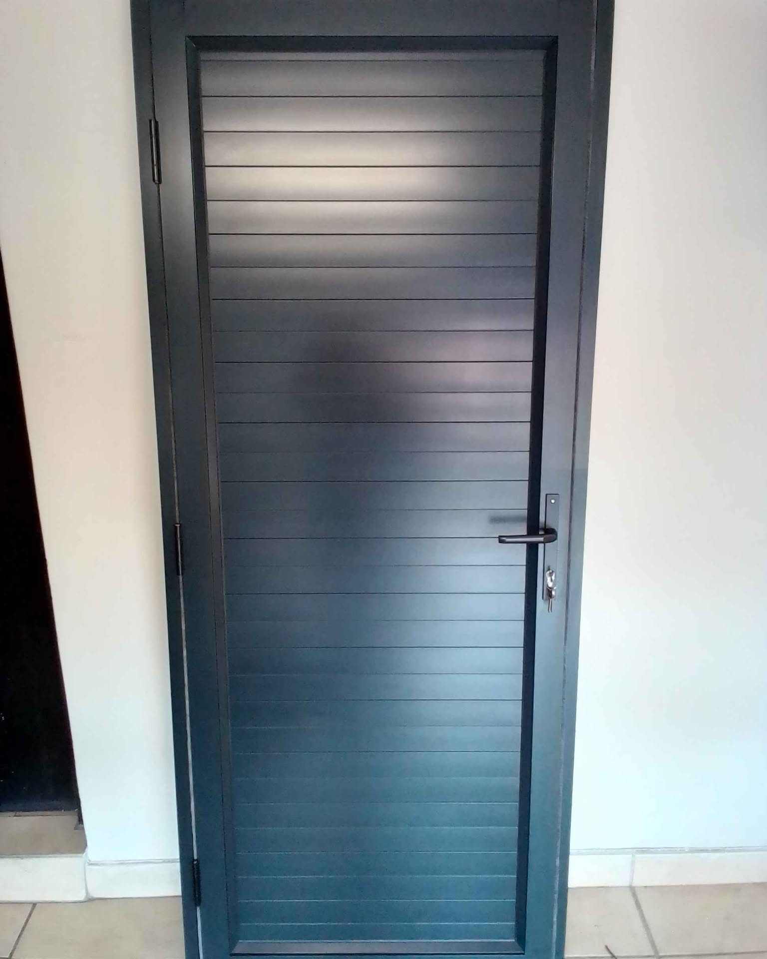 Door Man Facebook ad: Brand New Aluminium Door for Sale R4950 (900 x 2100)…