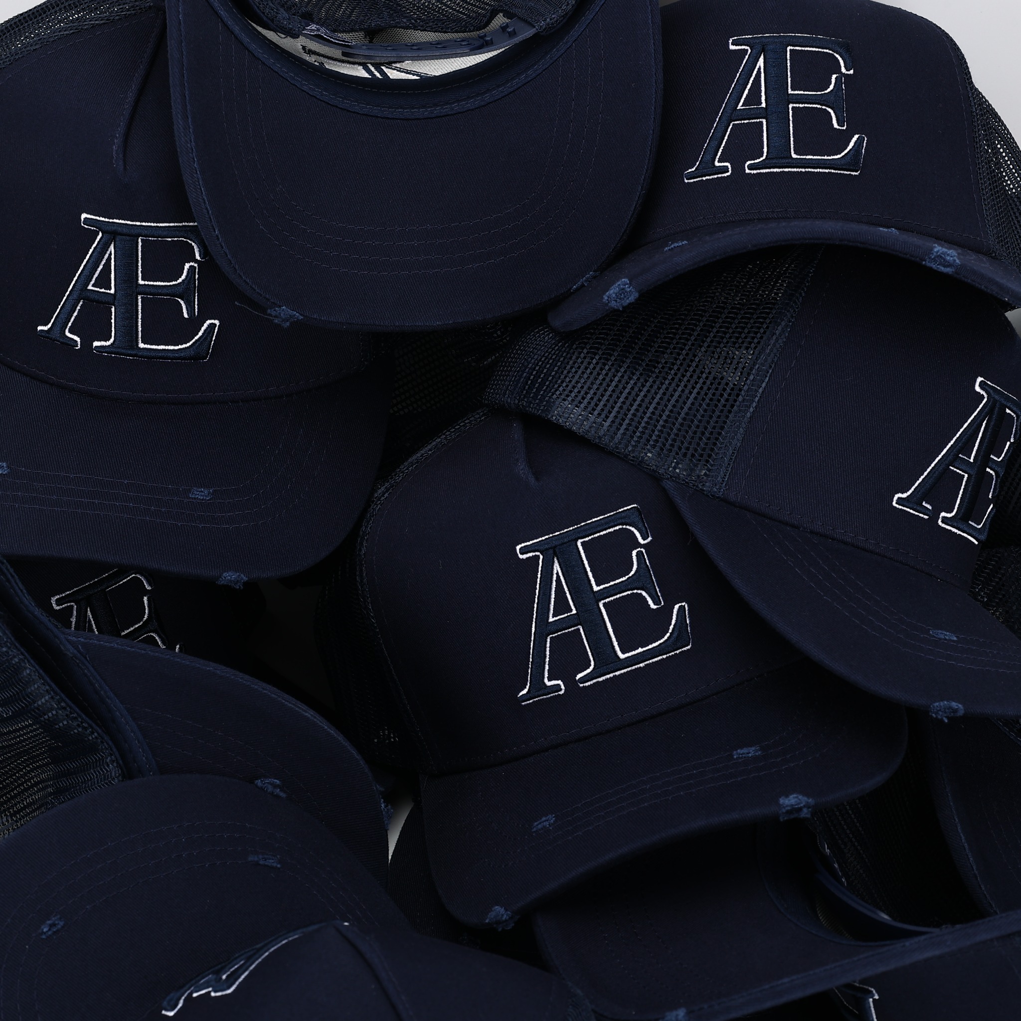 A É C L O Facebook ad: The Cap You Can't Stop Seeing.