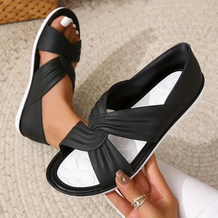 Dudeshoes Facebook ad: Buy 2 Free Shipping Women's Orthopedic Sandals