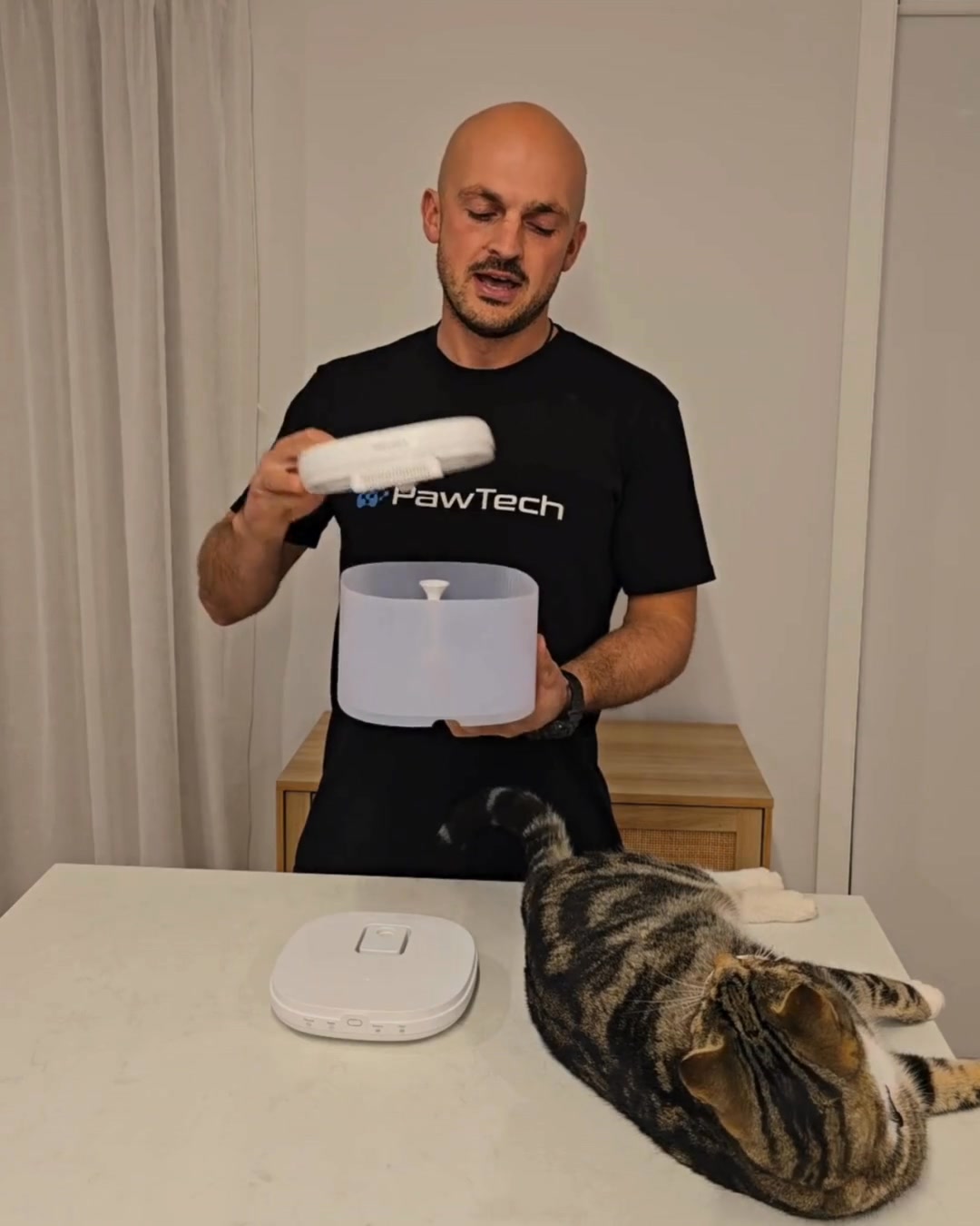 pawtechnz Facebook ad: Go Away This Weekend, Your Cat Stays Hydrated