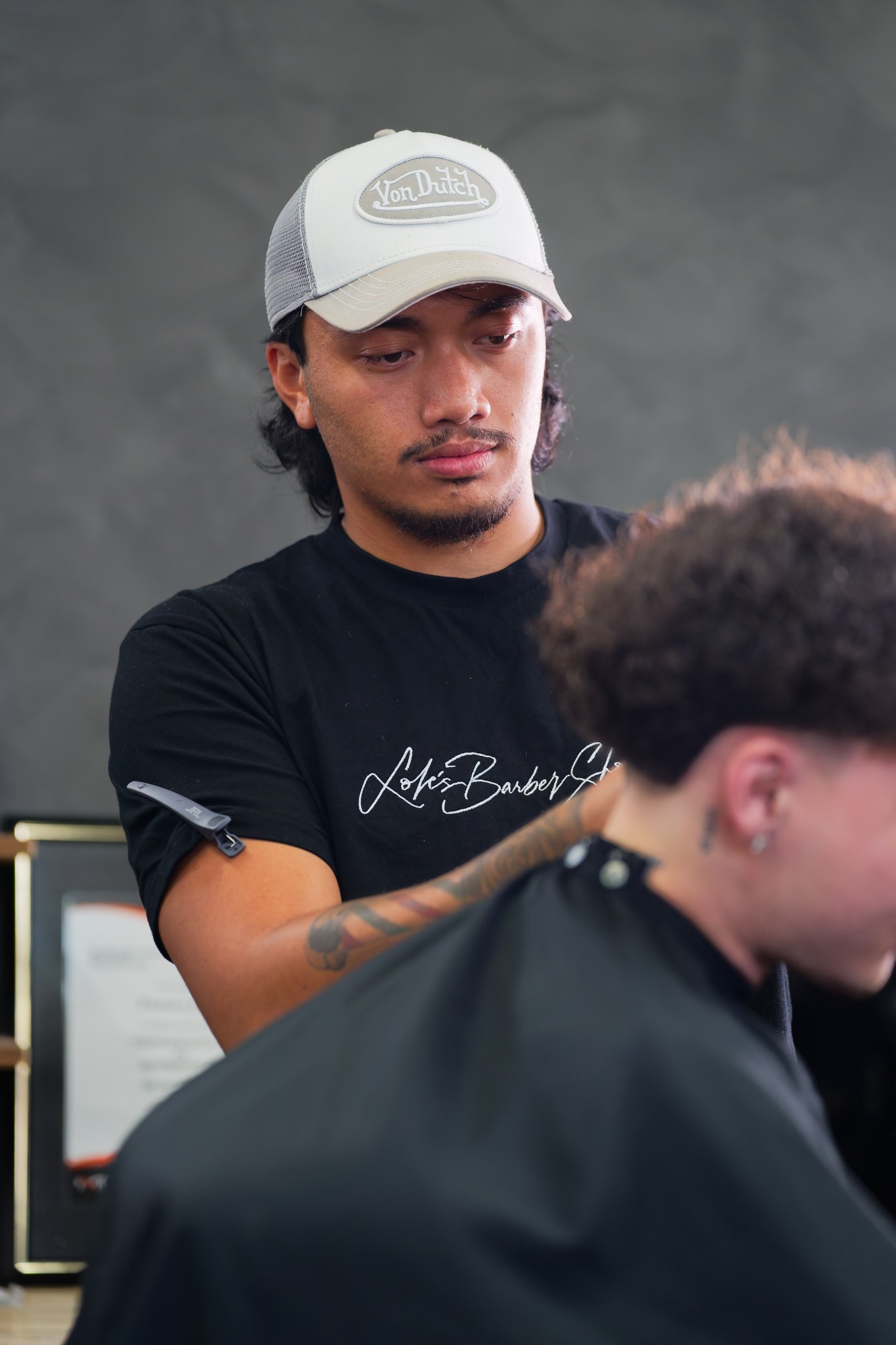Lole's Barber Shop Facebook ad: At Lole's Barber Shop, we’re more than haircuts.