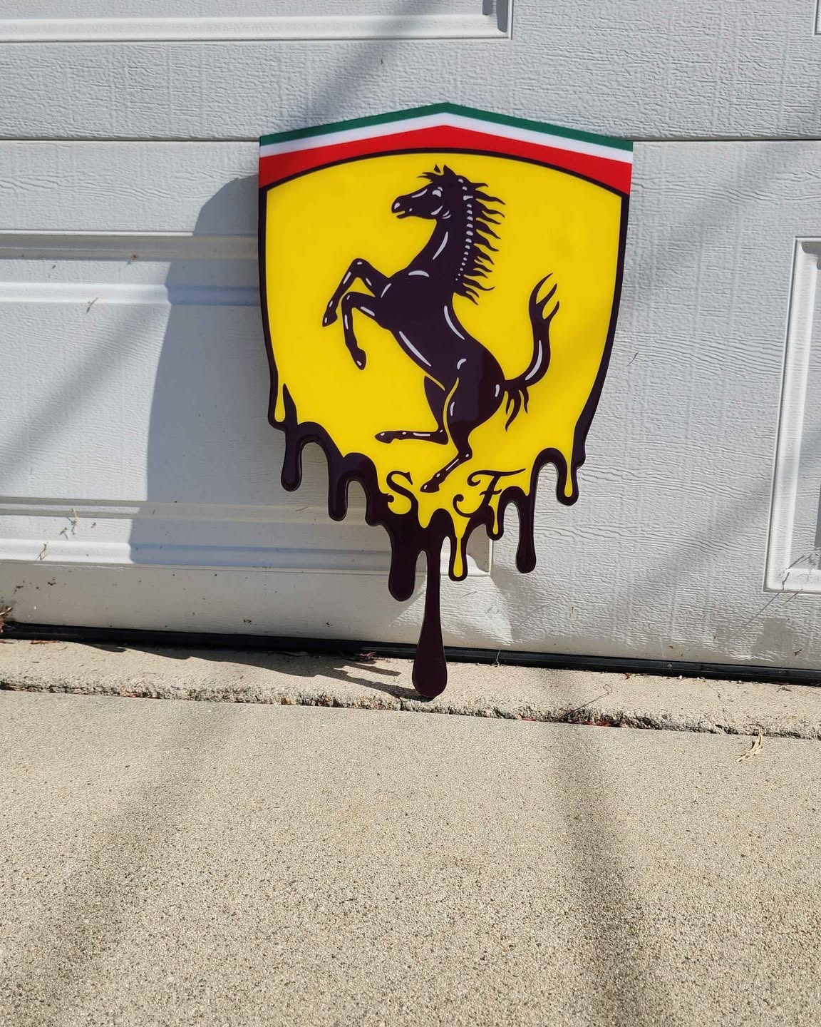 Samantha Aguilar Facebook ad: Ferrari Drip Wooden Garage Sign, 14½x23