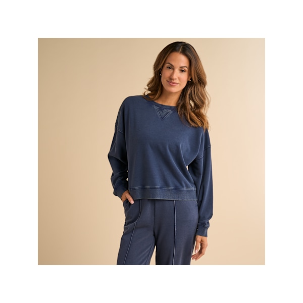Natural Reflections Facebook ad: Cooler days call for cozy layers, comfortable fits…