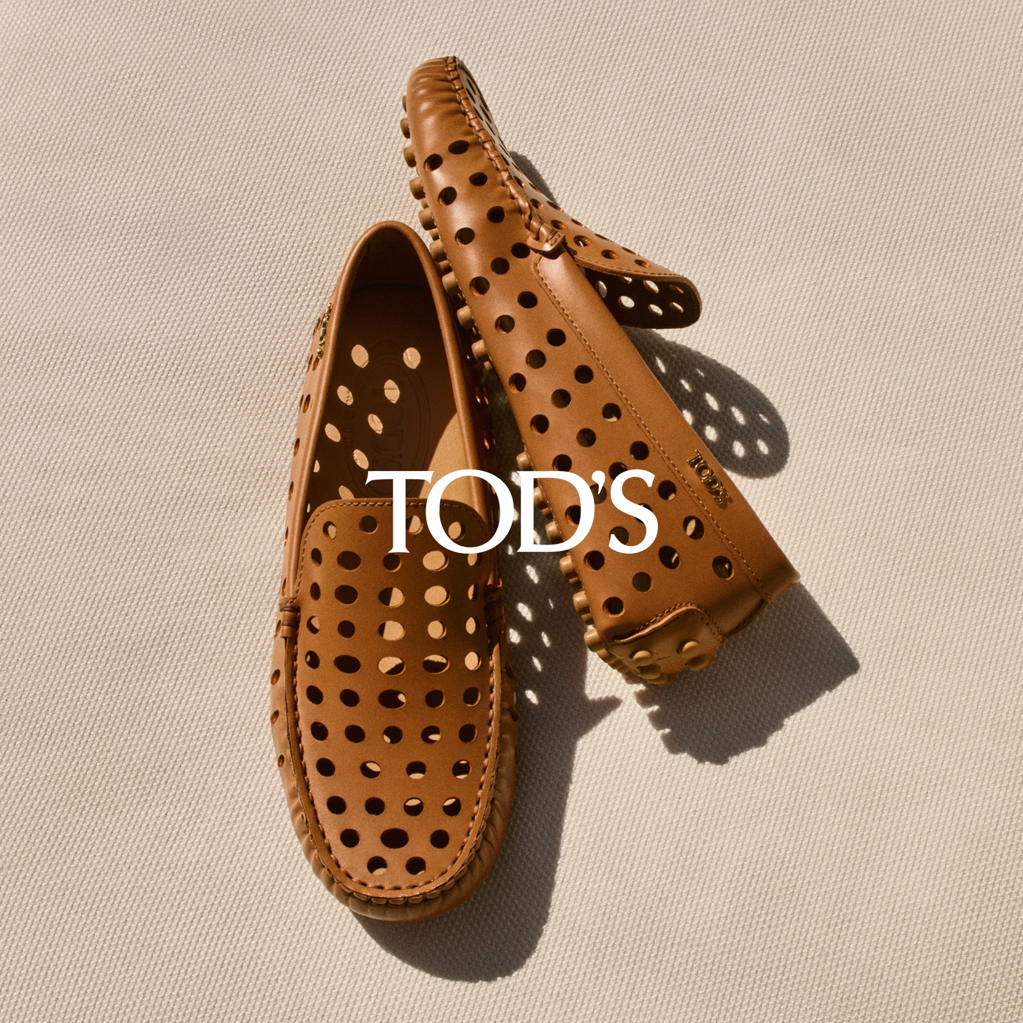 Tod's Facebook ad: Find your nearest Tod's boutique and discover the…