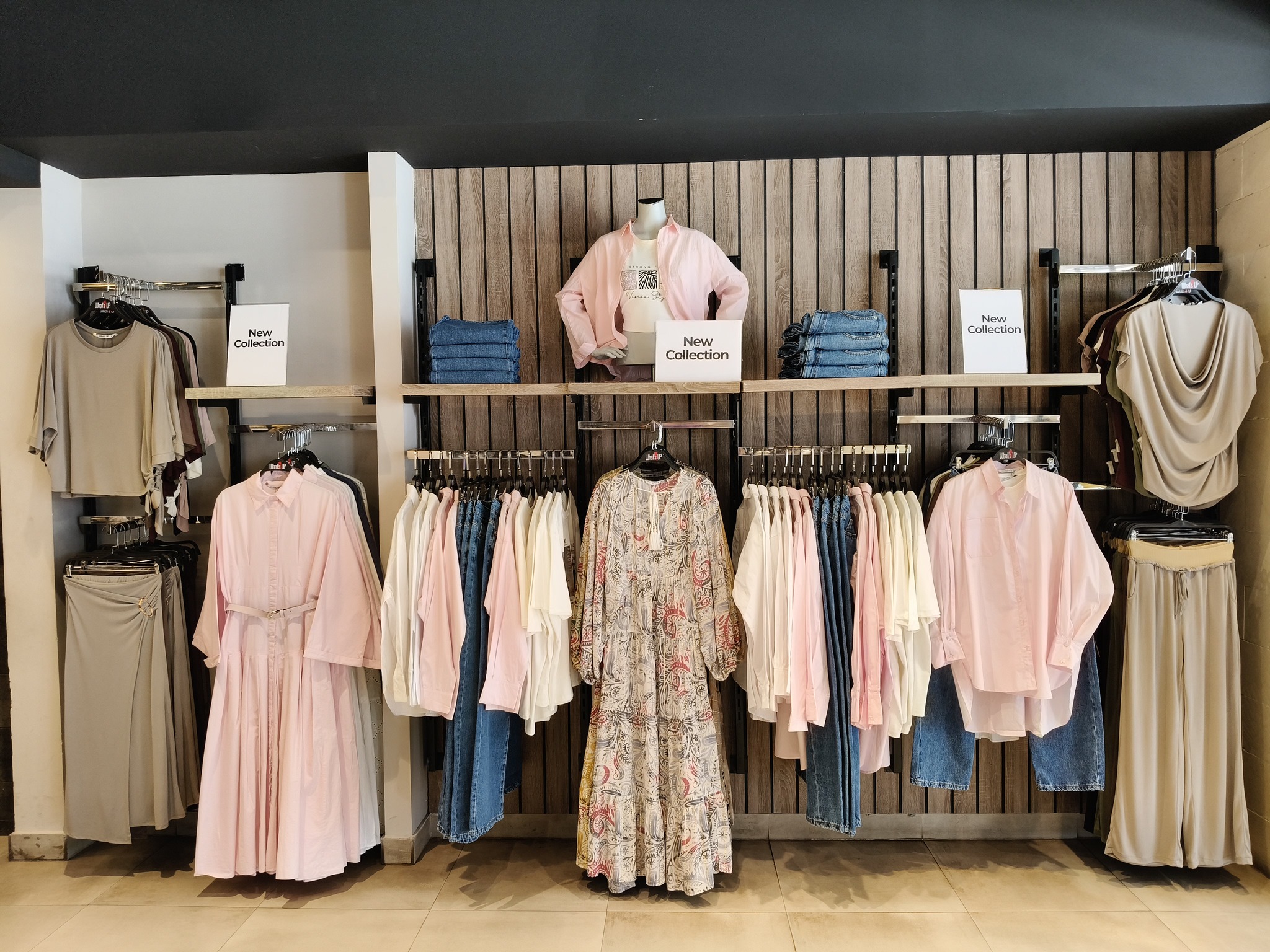 What's Up For Women's Wear Facebook ad: اختارنا ليكي ستايلات عملية بتفاصيل رقيقة وألوان مبهجة…