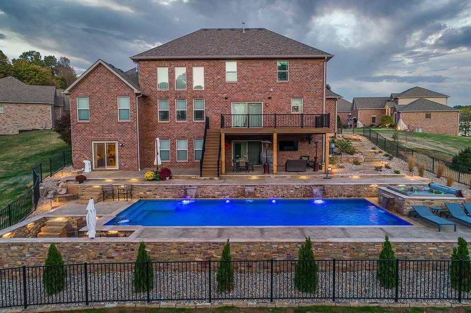 Altered Grounds Landscaping and Outdoor Services Facebook ad: Vacation at home this summer with a new…