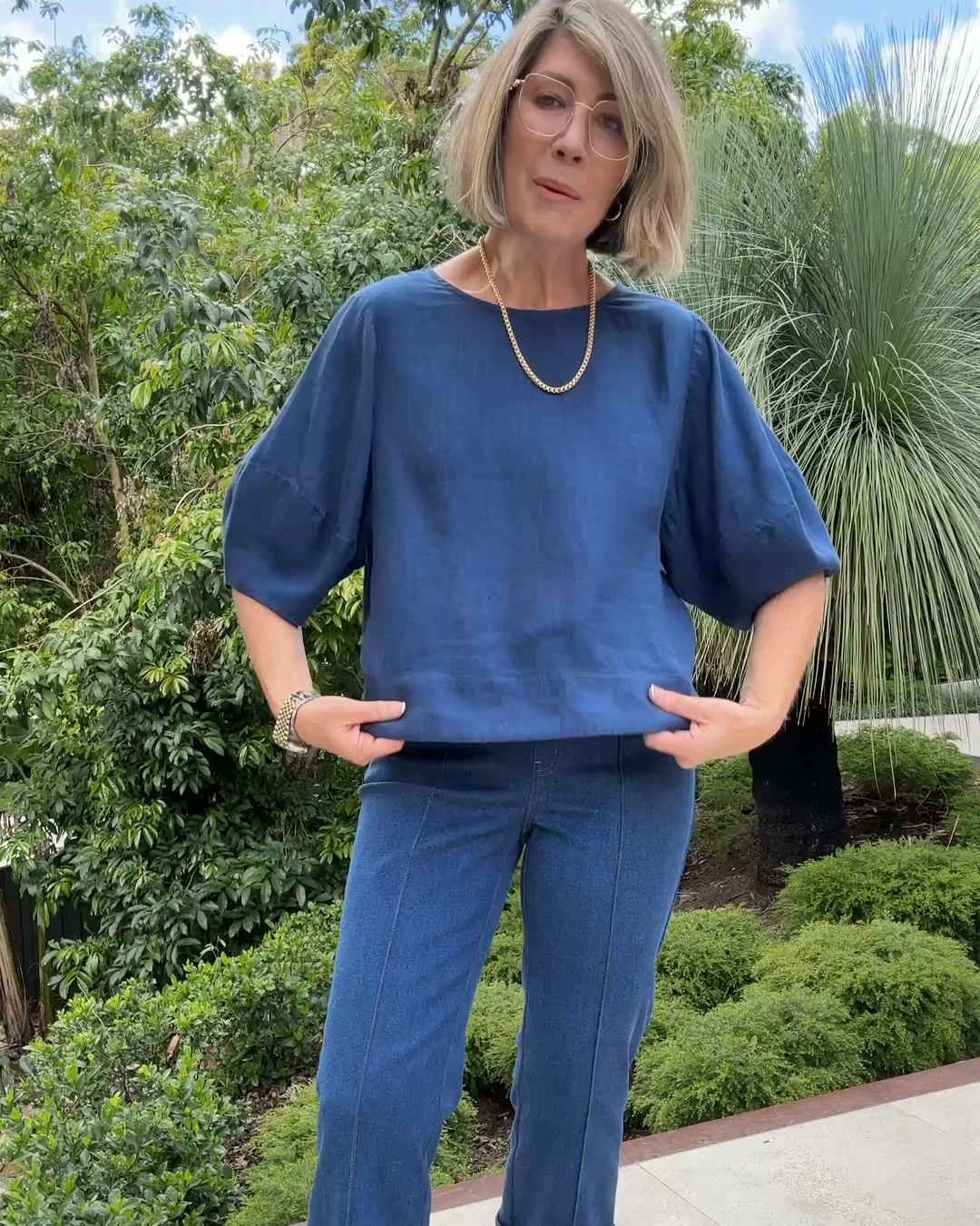 Blue Illusion Facebook ad: Linen Button Back Top - Navy Delave